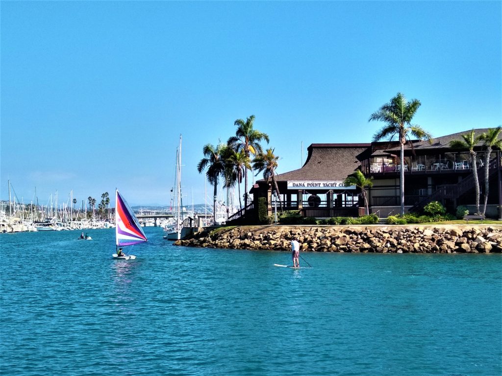 Nathan sailing and Gavin paddle boarding at Dana Point