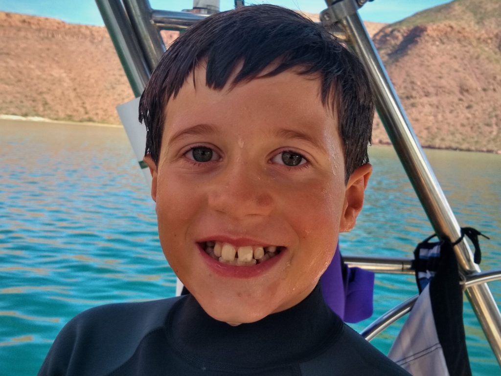 A happy guy  after success on the wake board