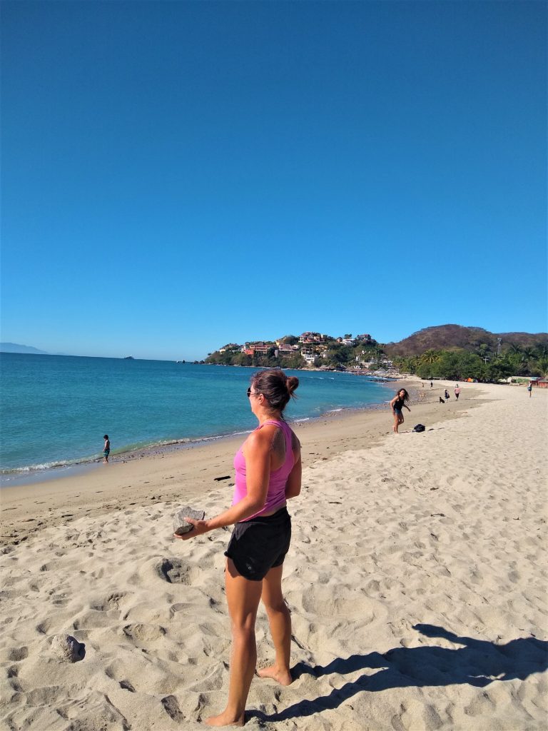 Lifting rocks, Burpees, sit ups, sprints, and lunges finished off by a quick swim in the ocean - a perfect way to start the morning!