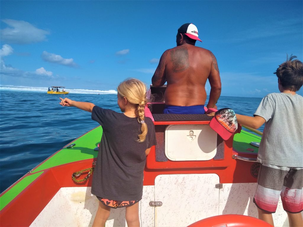 Julia spots a wave at Teahupoo.