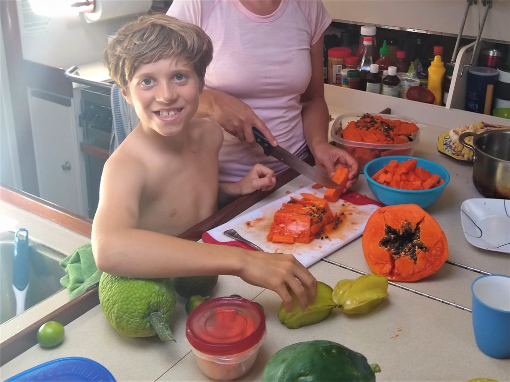 A very happy Nathan with some ripe Papaya. We gorged on it in Moorea. Absolutely divine.