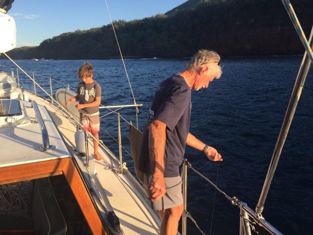 Fishing off of the boat at anchor.