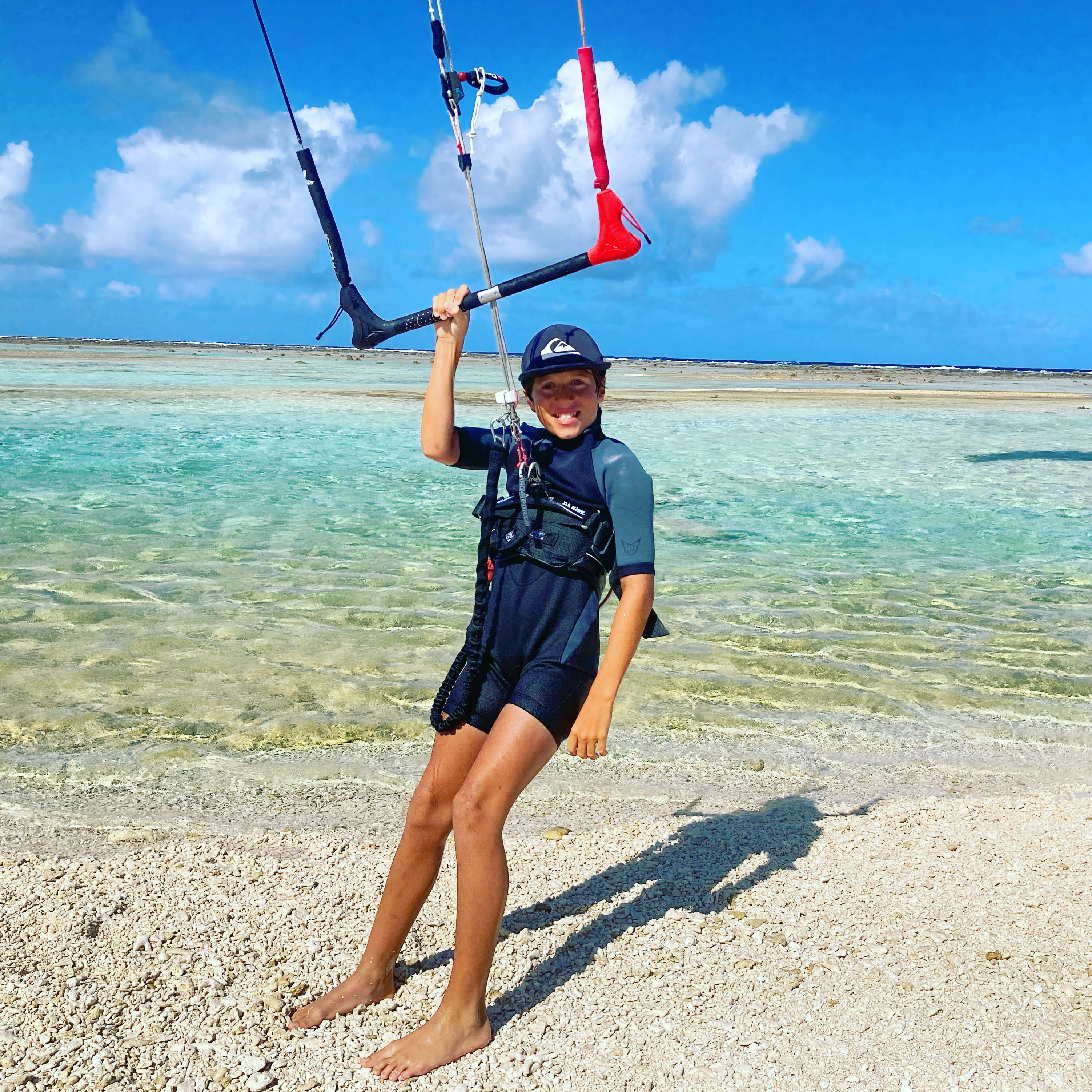 Mom, lets jump over this sandbar!